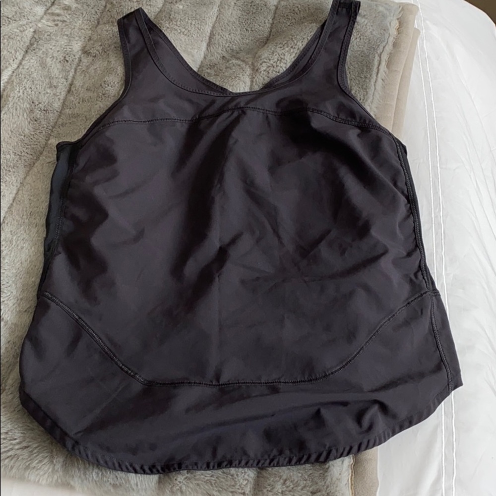 Lulu lemon tank top. Loose fit absorbant tank.